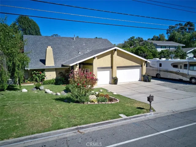 Yorba Linda home with  large yard, RV parking, and pool.