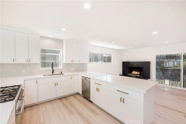 Main House (3 bed 2 bath): Stunning open concept kitchen remodel featuring new everything! Quartz countertops, new custom flat panel cabinets, stainless steel appliances, black mat fixtures throughout, gold pulls! Sliders go to back yard.