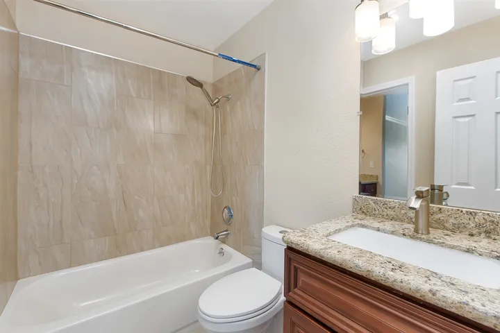 Upstairs full bath with tiled shower, all new everything!