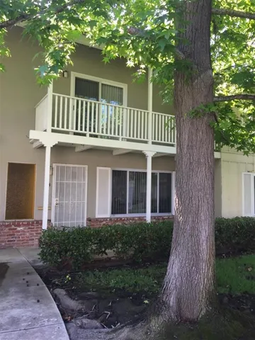 Upstairs balcony and ground level front entry