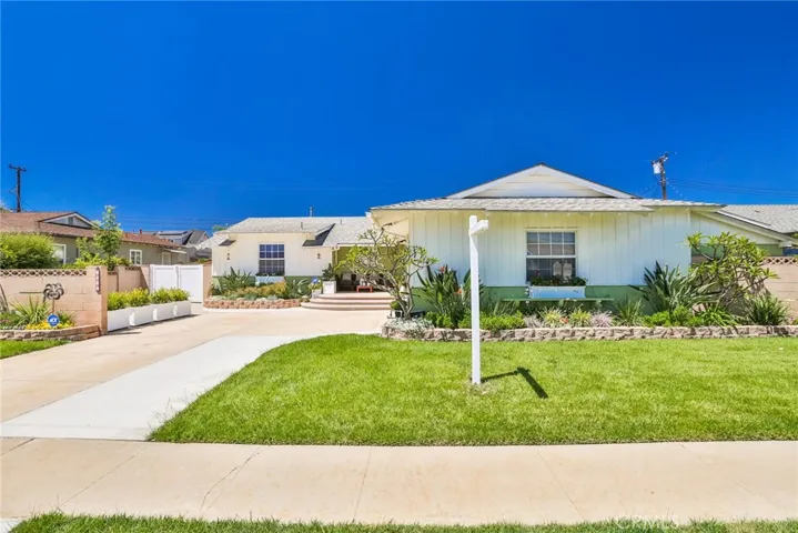Great location, beautiful curb appeal, RV access , new expanded front porch , widened driveway , new garage door with electric opener.