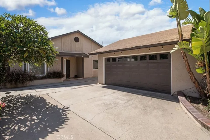 Oversized detached garage with rollup door and opener and side exit