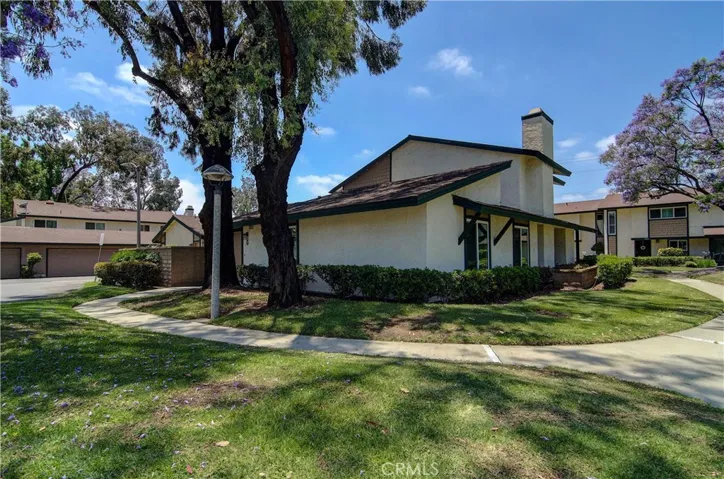 You'll love this end unit location with greenbelts on two sides.