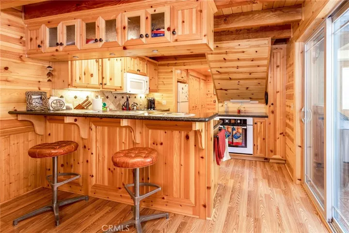 Bar area, and sliding door to the deck.