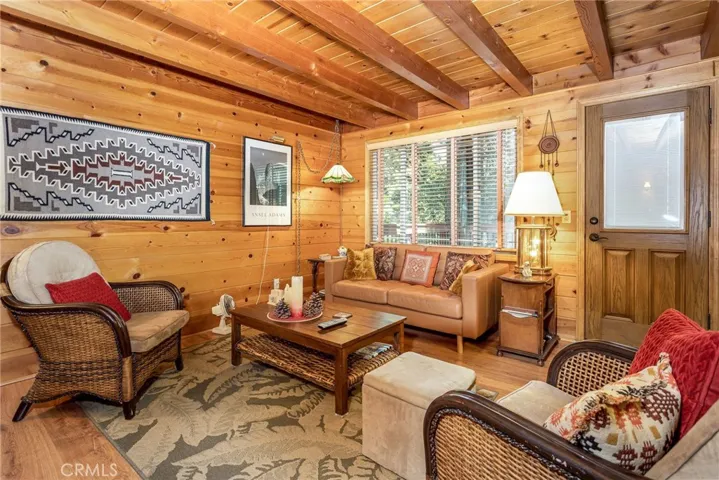Main level living room with door to the deck.