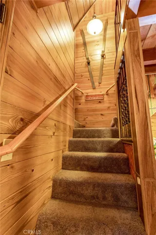 Staircase - left to the loft bedroom, right to the Master bedroom.