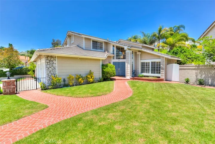 Large front yard with double door entry