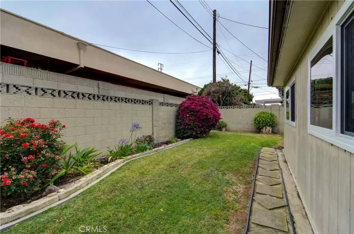 Rear yard has several "rooms" for you to create your own kind of use for each space.