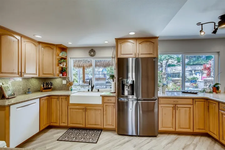 Stand at your farm sink and enjoy the waterfall views in the backyard!