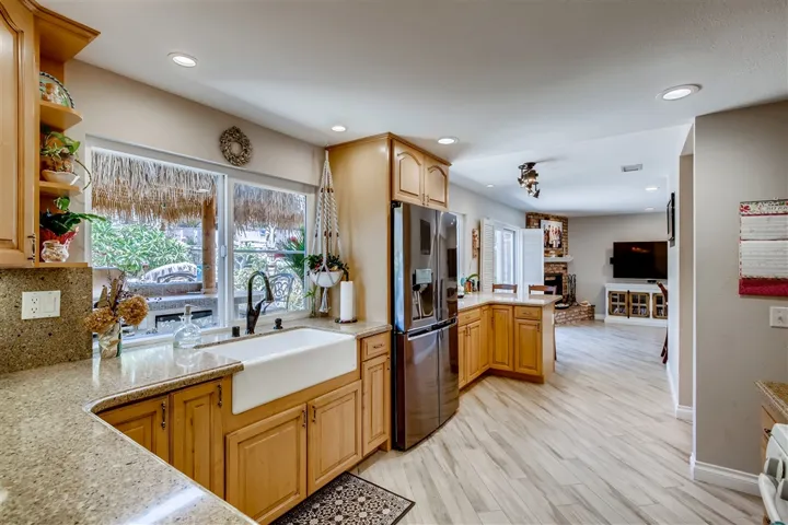Great entertaining kitchen with silestone counter tops and back splash, bosch dishwasher, LG refrig/freezer, & Maytag gas stove & oven.