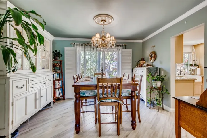 Dining Room is located between the kitchen & the family room. A sliding door gives you direct access to the backyard for entertaining or coastal breezes.