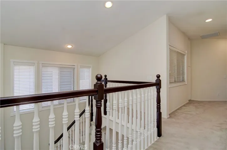Upstairs gallery makes a great transition between the master and guest/kid's bedroom wings.