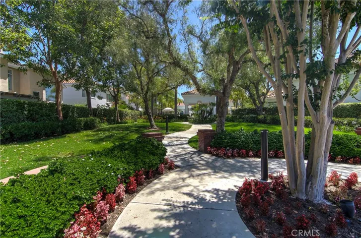 Stroll the private grounds and enjoy the nice landscape...or head to the community pool for a quck dip!