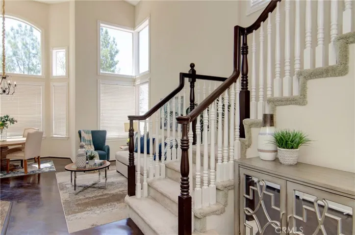 Raised foyer sets the stage for this dramatic floor plan with high ceilings and loads of natural light.