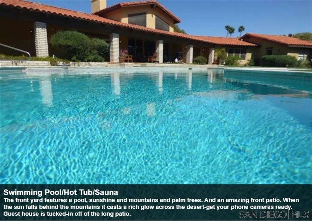 The front yard features a pool, sunshine and mountains and palm trees. And an amazing front patio. When the sun falls behind the mountains it casts a rich glow across the desert-get your phone cameras ready. Guest house is tucked-in off of the long patio.