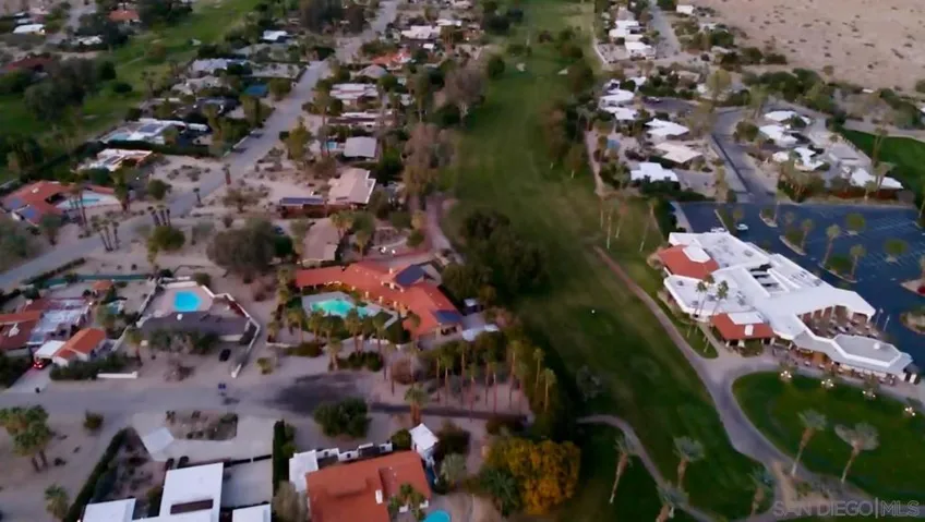 Awesome views looking out both the front through-house view and backyards to the De Anza Country Club Golf Course & all around to the beautiful desert landscape that circles the area and gives way to spectacular mountains. Country Club is just steps away!