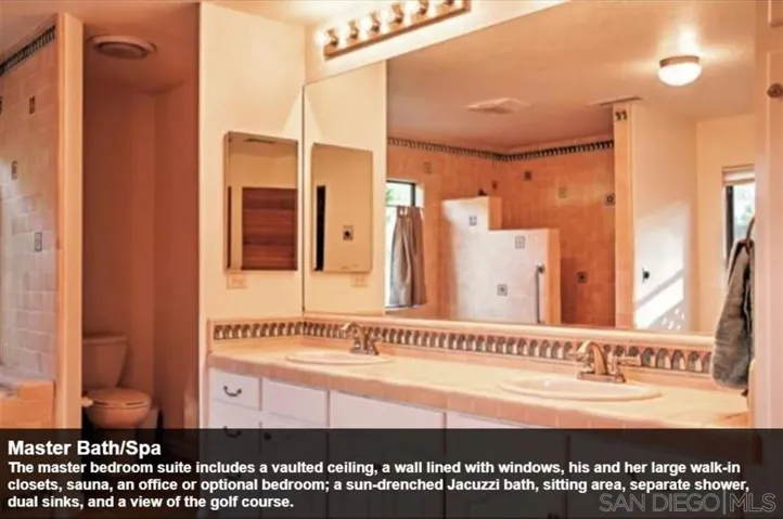 The master bedroom suite includes a vaulted ceiling, a wall lined with windows, his and her large walk-in closets, sauna, an office or optional bedroom; a sun-drenched Jacuzzi bath, sitting area, separate shower, dual sinks, and a view of the golf course.