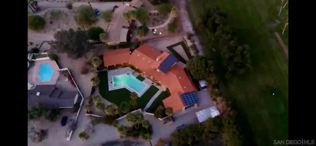 Awesome views looking out both the front through-house view and backyards to the De Anza Country Club Golf Course & all around to the beautiful desert landscape that circles the area and gives way to spectacular mountains. Country Club is just steps away!