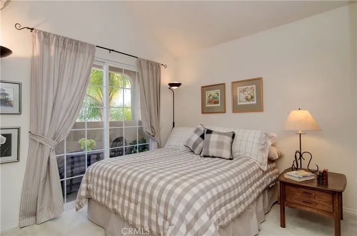 Vaulted ceiling adds an extra volume of space to this kid's/guest room.