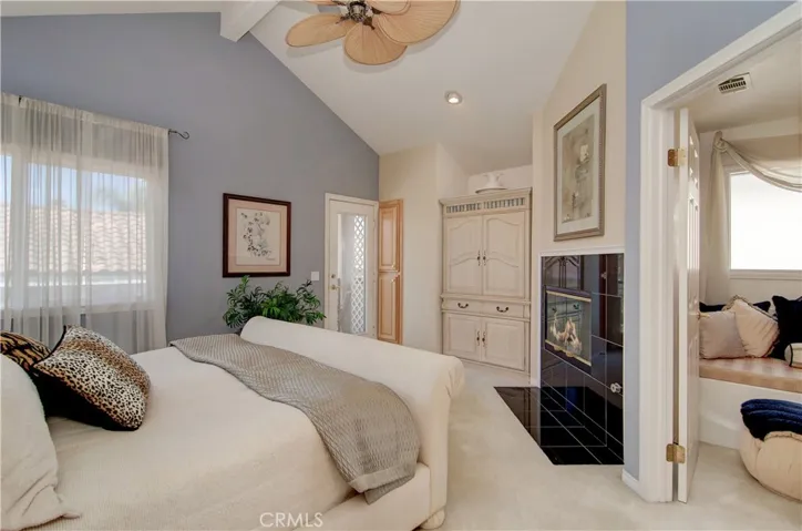 Private master suite has it all...fireplace, balcony, vaulted ceiling and room for king size bed...what a great place to end the day!