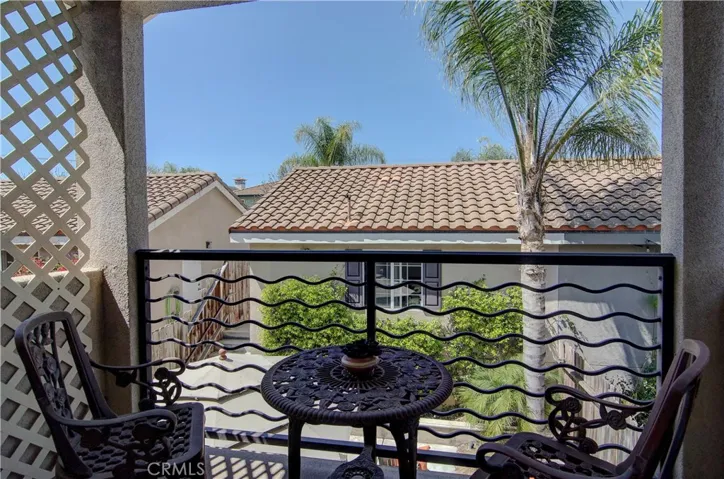 Inviting, covered master suite balcony is thee spot for morning coffee.