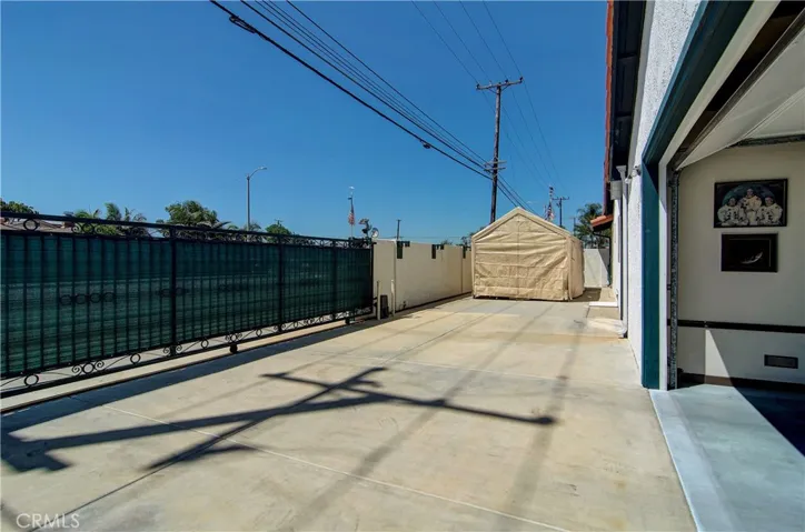 WOW again...check out this amazing driveway plus extra parking for RV...all behind huge automatic security gate.