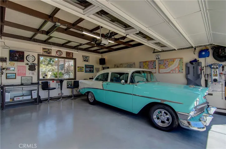 Another WOW...and we're not just talking about the car...this is a fun, fun, fun garage space...pull down stairs to overhead storage space too!