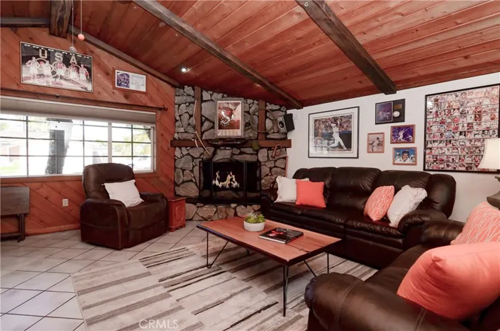 Separate bonus/game room is a WOW with beam ceiling and stone fireplace. Separate entrance and adjoining bath could make this the perfect in-law or ADU.