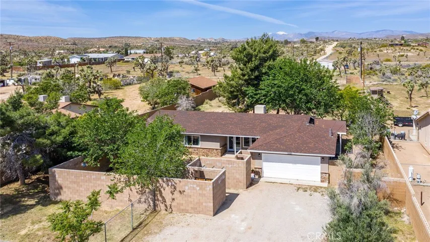 Over 1/2 acre of extremely private yard to spread out in.