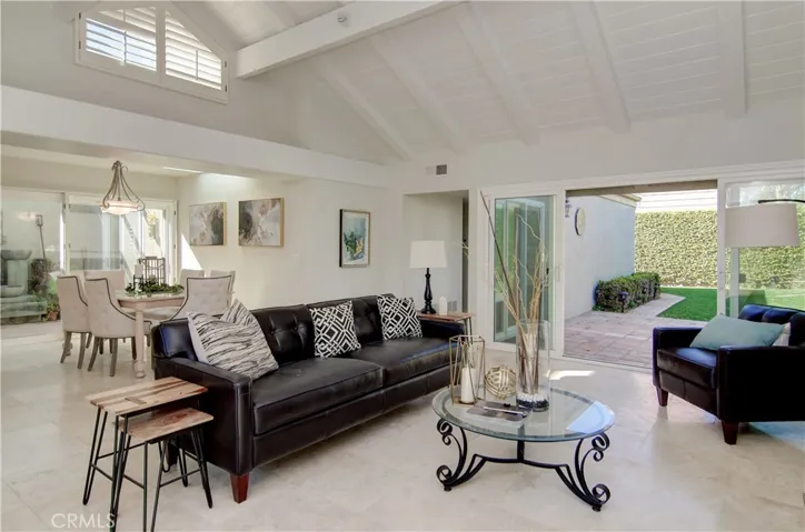 living area with french doors to private yard