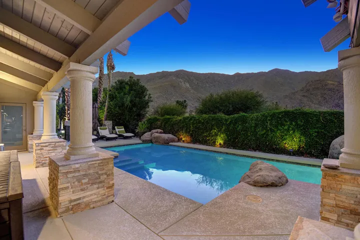 COVERED PATIO TO POOL AND MOUNTAINS NIGH