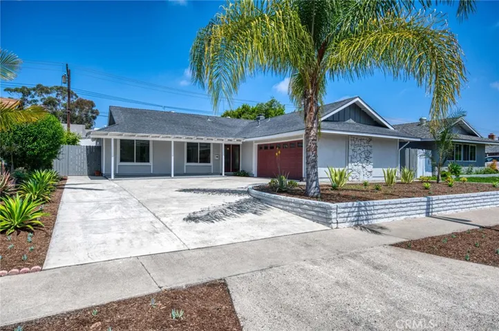 Low-maintenance and low-water usage front yard at 24091 Silverbay Drive w tons of parking for the Main Residence and the Guest House!