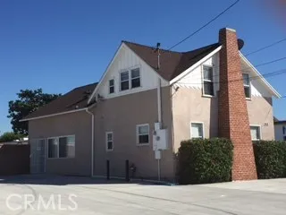 Corner Lot with 1100 sq. ft. 3+2 house and rear separate 400 sq ft. office