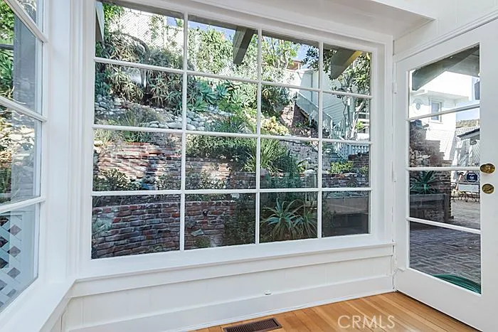 A close up of the windows of the family room, facing the patio and terraced garden.  This is a perfect place to grow herbs!