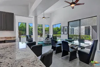 kitchen is open to dining and sitting area