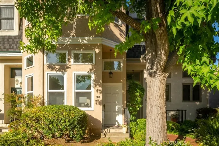 Your front door is surrounded by trees, shrubs and walking paths.