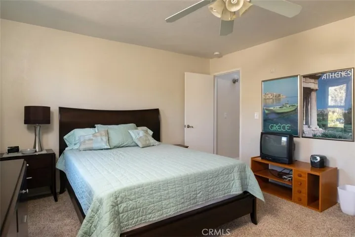 Second master bedroom complete with an attached bathroom.
