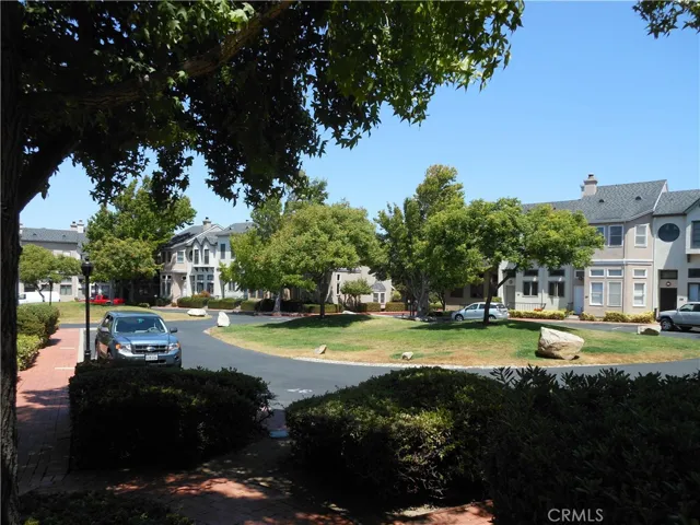A view from your front door looking at the park like setting.