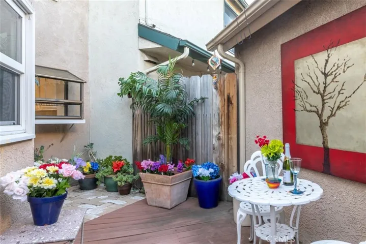 Grow flowers, spices and vegetables in this sunny space behind the kitchen.