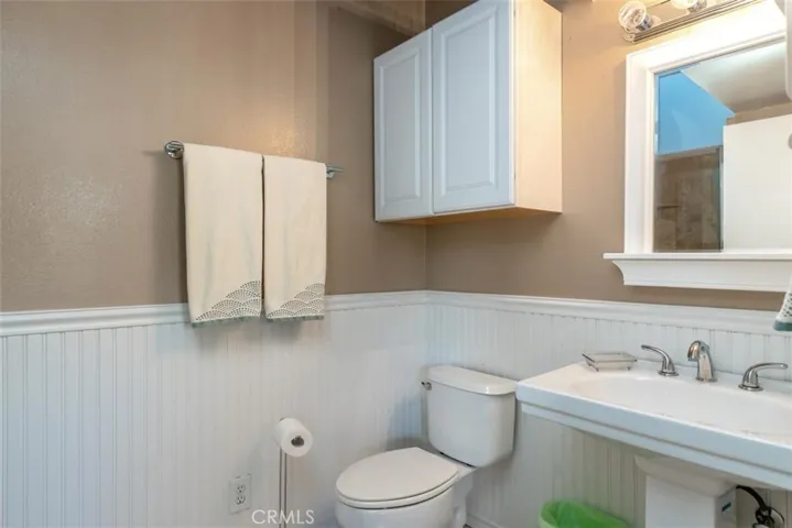 Second master bathroom complete with a shower.