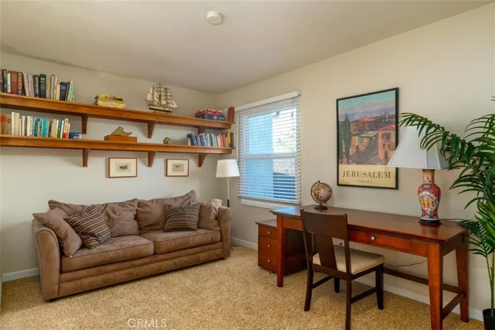 Upstairs loft, library, music room or extra bedroom for guests.
