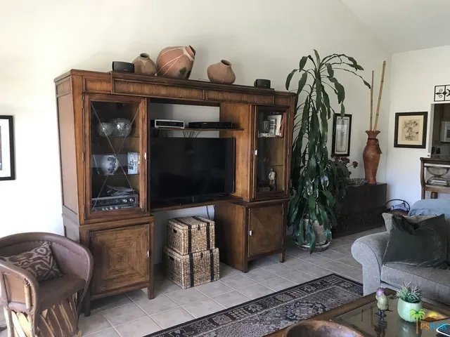 Spacious living room with tile flooring