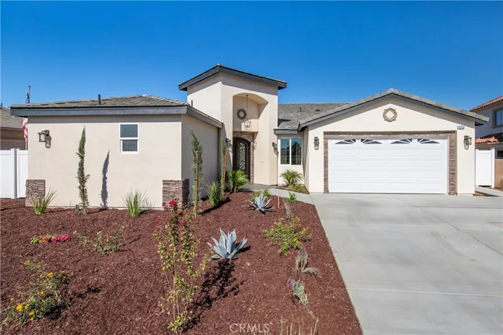 Front of home with a 480 sq ft attached garage
