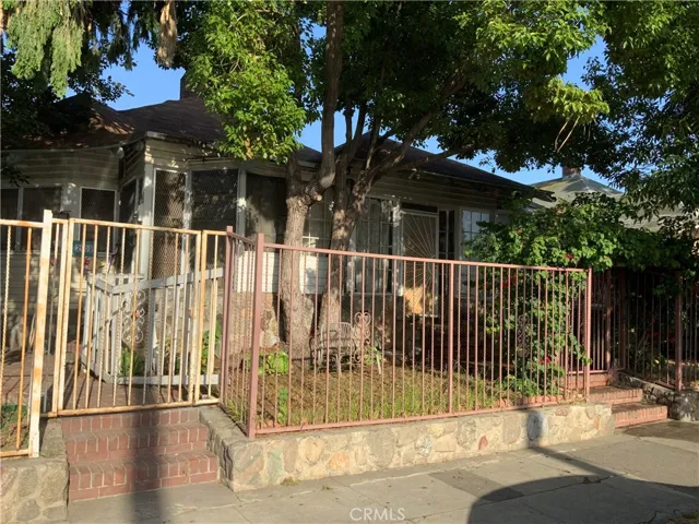 Front 2908 left side when facing property entrance.