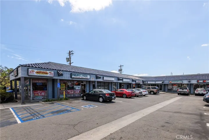 Rear parking lot and building.