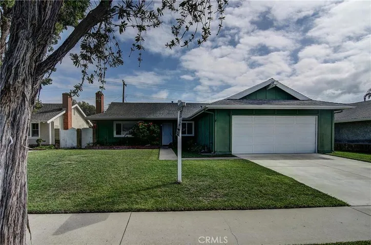 Fabulous west facing location, and just steps to the wetlands! note the roll up garage door, and inside it is newly dry-walled and plumbed for laundry.