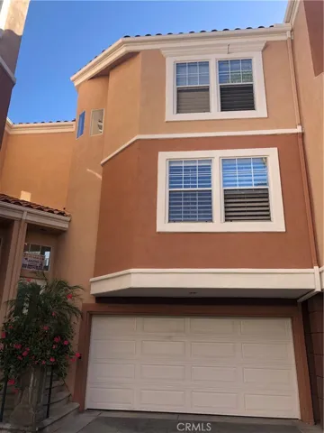Two car direct-access attached garage below condo