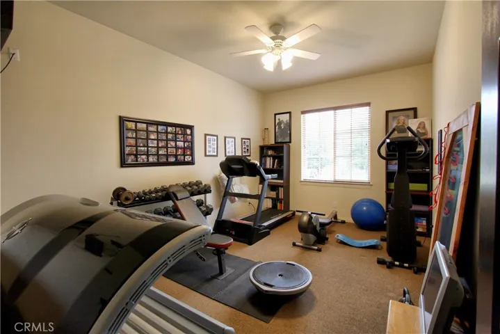 Home gym that could possibly become a 6th bedroom.  Picture #1
