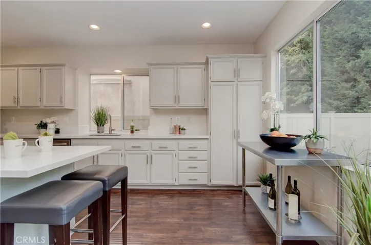 Breakfast bar is the perfect place for homework or just hanging out with the cook.