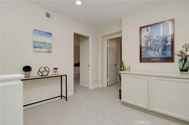Upstairs loft area makes for nice transition between rooms...extra cabinetry always comes in handy.